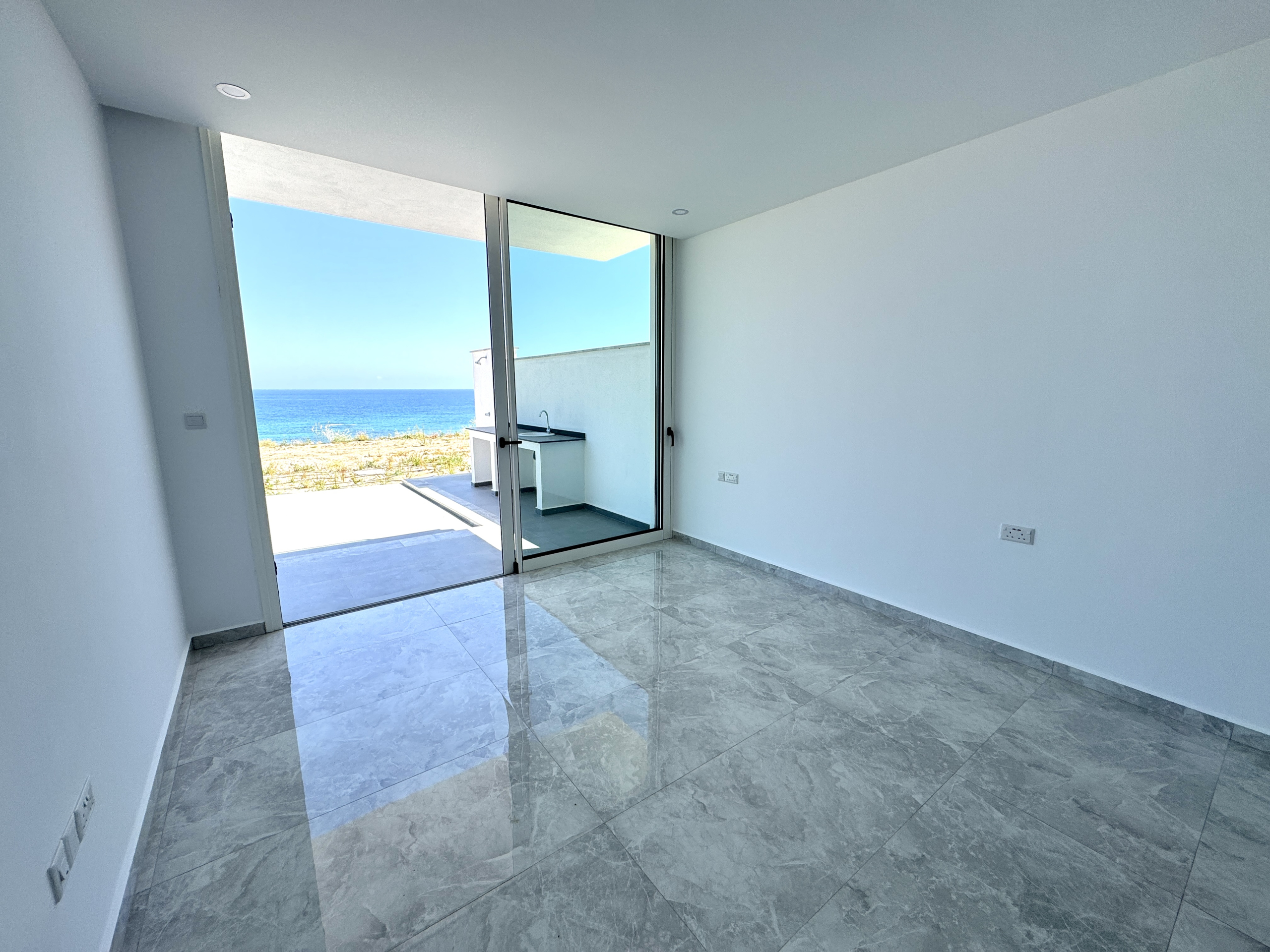 Sea front 4 bedroom luxury duplex apartment  with private beach