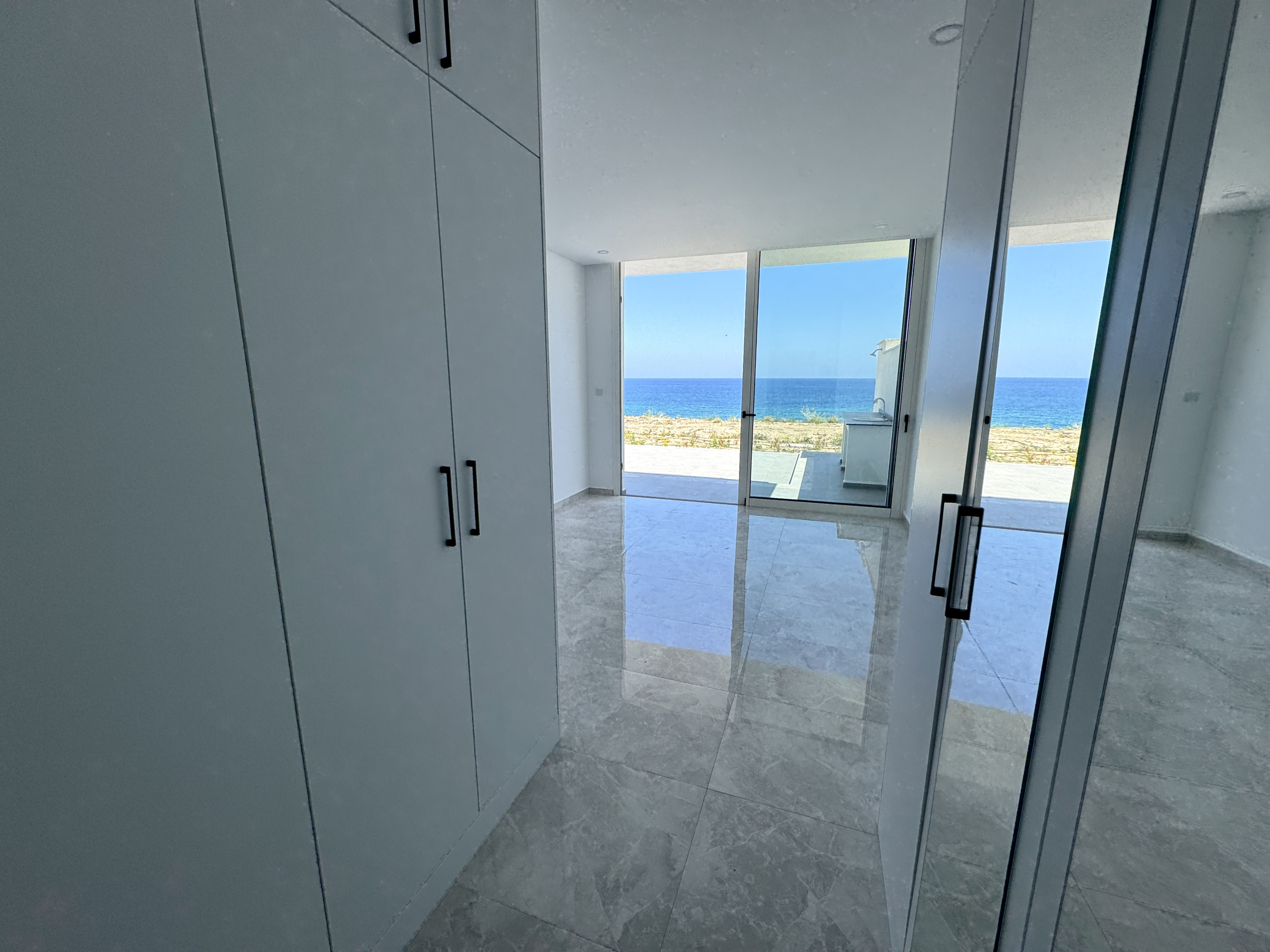 Sea front 4 bedroom luxury duplex apartment  with private beach