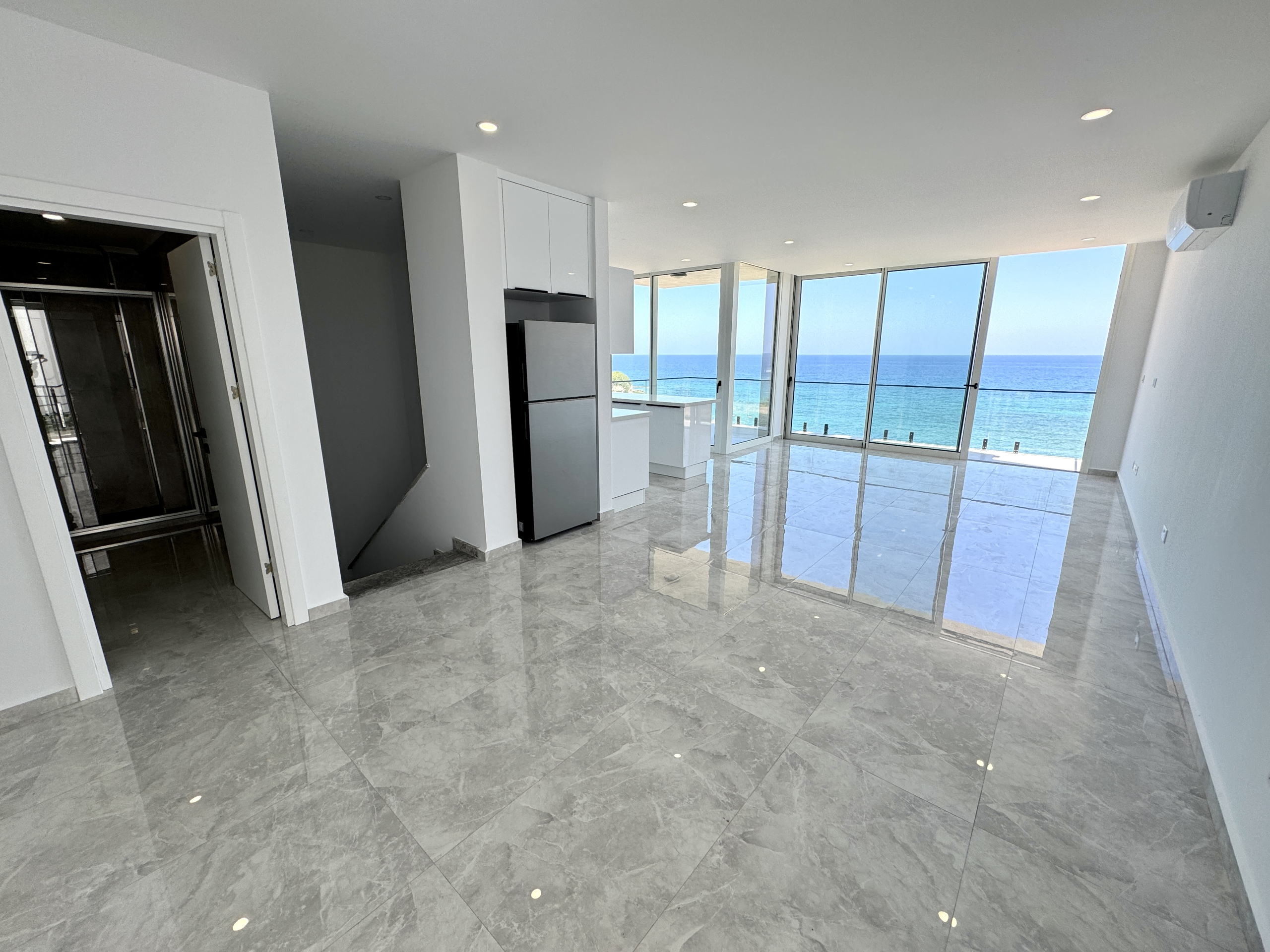 Sea front 4 bedroom luxury duplex apartment  with private beach
