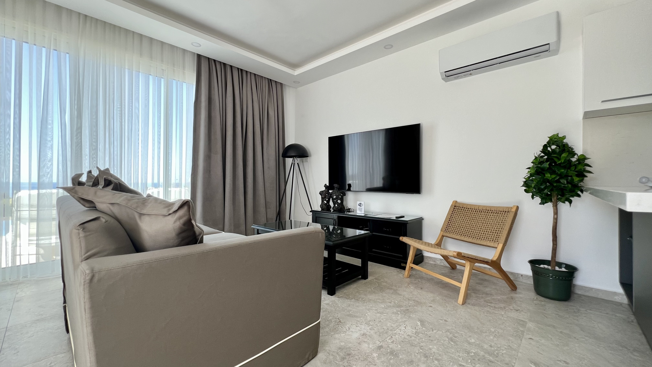 Sea front 3 bedroom garden apartment with private swimming pool